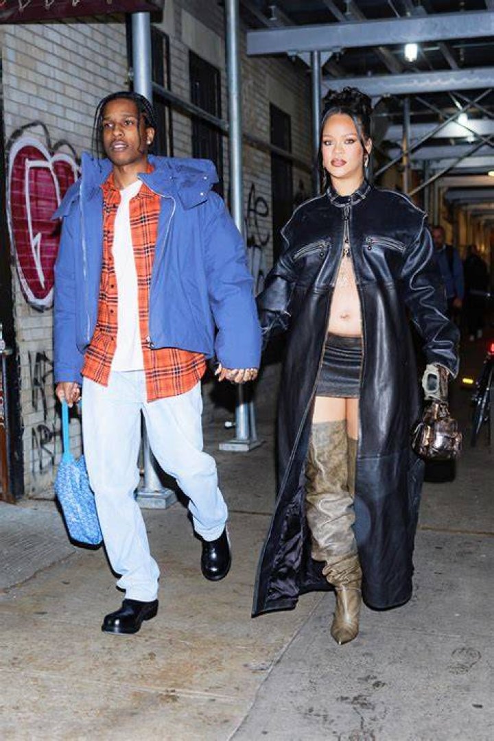 
Rihanna Slays Thigh High Boots & Mini Skirt Out With A$AP Rocky In NYC 